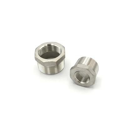China Bushing Threaded NPT Hex Bushing 304/304L 3000# Forged Stainless Steel Pipe Fitting en venta