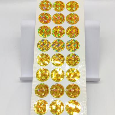 China Printed Hologram Sticker Roll Anti Counterfeit Rectangular Gold Hologram Sticker for sale