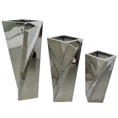 China Acabamiento de acero inoxidable rotatorio del espejo del plantador de la flor del metal de potes del jardín en venta