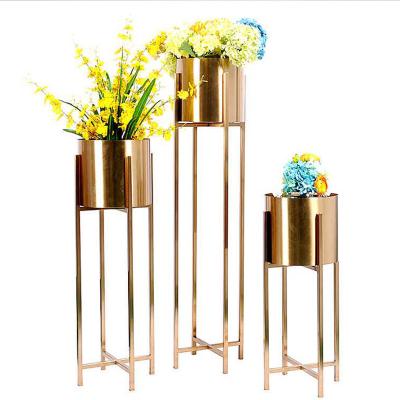 China Gold Plant Pedestal Metal Flower Planter Golden Flower Pot Stand for sale