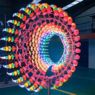 China Metal Kinetic Wind Sculpture With Colourful Light Contemporary Art Sculpture for sale