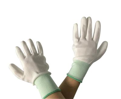 China La palma blanca del poliuretano cubrió el guante inconsútil del trazador de líneas del poliéster de los guantes estáticos antis en venta