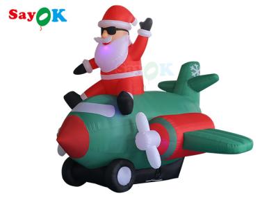 China Oxford Cloth Inflatable Old Man LED Christmas Santa Claus Flying Airplane Blowing for sale