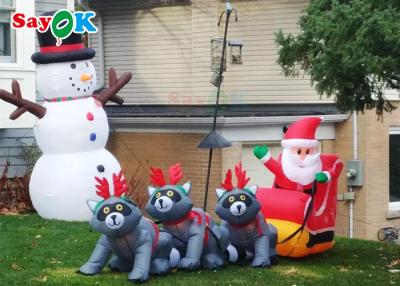China As decorações infláveis do Xmas do Natal gigante três guaxinins puxam Santa Claus To Give Gifts à venda