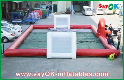 China Giant Inflatable Football 10m Big Inflatable Red Football Field WIth Gate Use Strong PVC Material for sale
