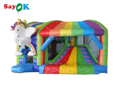 China Rainbow Kids Inflatable Jumping Castle Unicorn Bouncy Castle With Slide for sale
