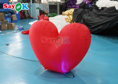 China Corazón gigante inflable Luz rojo Proposición de boda Escenario para eventos increíbles en venta