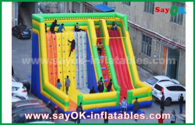 China Adult Inflatable Slide 9.5*7.5*6.5m Colorful Inflatable Bouncer Slide With Climbing Wall For Amusement Park for sale