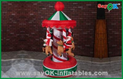 China Funny Christmas Carousel Inflatable Holiday Decorations Air Blown Inflatables for sale