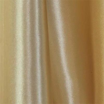 China 50dx75d Gold Chiffon Fabric 87gsm Poly Satin For Blouses And Dresses for sale