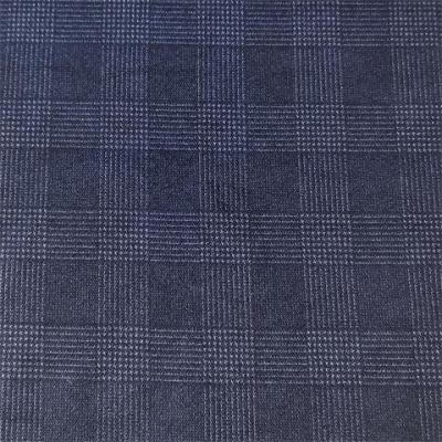 Chine les tissus 105dX105d de l'habillement des hommes de 200gsm 135CM ont tricoté la liaison de tissu de polyester de suède à vendre