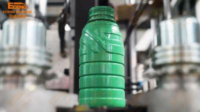 China Orange 4 Cavity Plastic Automatic PET Bottle Blowing Machine 9kg/Cm2 for sale