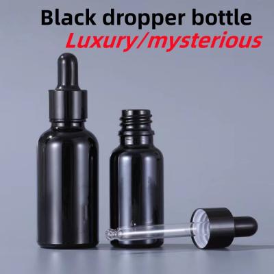 China 5ml 10ml 15ml 20ml 30ml 50ml 100ml Black Essential Oil Bottle Glass Dropper Bottle for sale