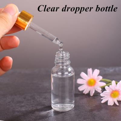 中国 15ml 20ml 50ml 100ml luxury empty Clear Transparent Serum hair Essential Oil Glass Dropper Bottle for skincare 販売のため