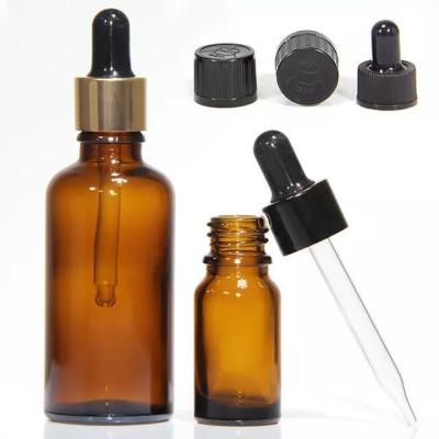 China 10ml 20ml 30ml 50ml Mini Round Empty Cosmetic Glass Essential Oil Bottle with Plastic Black Dropper à venda