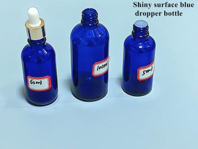 China 10ml 20ml 30ml 50ml Empty Boston Round Cosmetic Packing Empty Blue Essential Oil Glass Dropper Bottle with Dropper Cap for sale