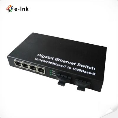 China 10/100/1000M Media Converter 4-TX + 2-FX ((SC) Port Fiber Switch for sale