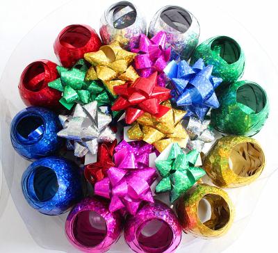 中国 プラスチック リボンの色紙片の星の弓サテンの装飾のためのカールのリボンの卵 販売のため