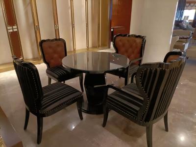 China Gelaimei Leather Upholstery Glass Dining Table And Chairs Diameter 1 Meter for sale