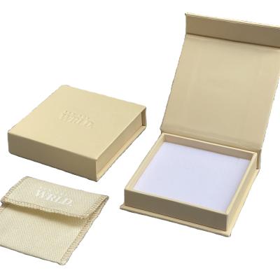 China Customized Beige Paper Magnet Box and Cotton Pouches for sale