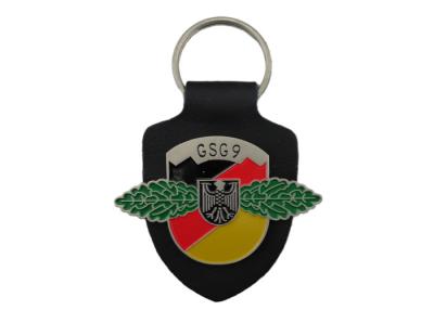 China Keychains de couro personalizado GSG9, Keychains relativo à promoção com logotipo com o emblema macio do esmalte à venda