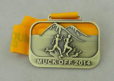 China 3D Die Casting Running Ribbon Medals For 2014 Muck Off And Antique Brass Plating for sale