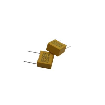 China Radial X2 Safety Device Capacitor Dissipation Factor ≤ 0.1% and Affordable 0.1UF/310VAC for sale