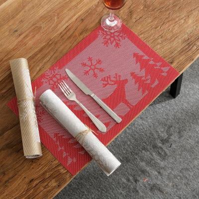 China Sustainable Durable Non-Slip Waterproof PVC Christmas Place Mats With Reindeer And Snowflake Table Mats Christmas Decoration for sale