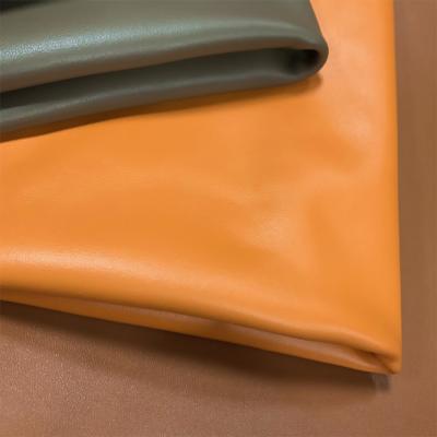 China No Fade Apparel Leather Fabric Olive Green Bright Orange Pu Microfiber Leather for sale