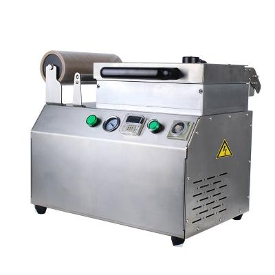 China DUOQI-DQ240VCT Multifunctional Tray Pallet Vacuum Skin Packing Machine for Frozen Food for sale