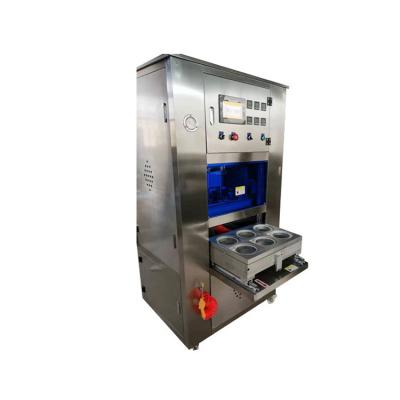 China Máquina de selagem a vácuo de embalagem automática de aço inoxidável 1200 copos/h à venda