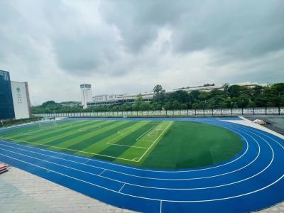 China Pista de carreras azul sintética/pista de carreras de caucho plástico Campo deportivo en venta