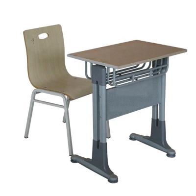 China Wooden Height Adjustable Primary School Table And Chairs for sale