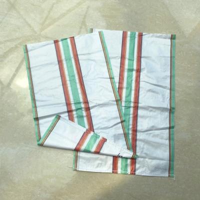 China El fotograbado del OEM 50kg que imprime el saco tejido los PP empaqueta el saco tejido plástico de la secuencia reciclable del lazo en venta