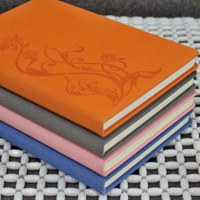 China Discoloration PU leather embossed notebook for sale