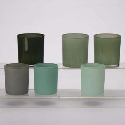 中国 OEMの円形のガラス瓶の蝋燭ホールダーは作られる色機械に吹きかける 販売のため
