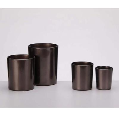 中国 ODMは金属円形のガラス蝋燭ホールダーの無鉛コーヒー色に吹きかける 販売のため
