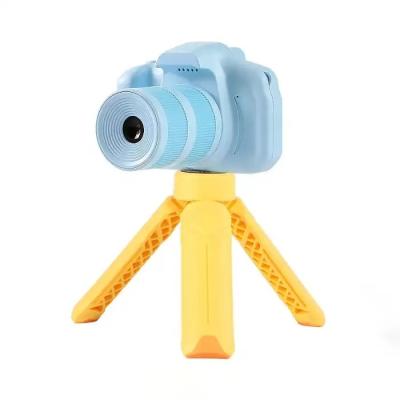 中国 耐久のおもちゃの子供のデジタル カメラのライト級選手の実用的な二重長いレンズ 販売のため