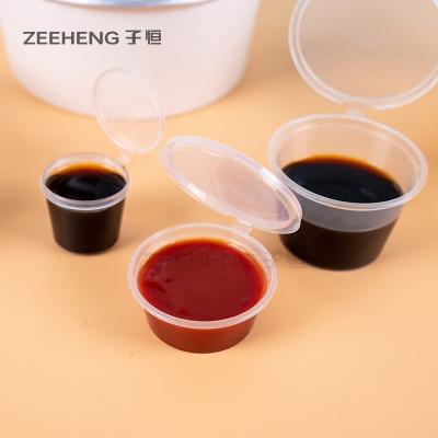 Chine Tasses réutilisables de sauce au soja en gros pp de restaurant, tasses jetables de sainte communion de conteneurs de pudding de 2 onces avec des couvercles à vendre
