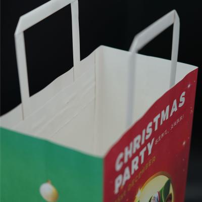 China OEM Luxury Christmas Packaging Debossing Custom Die Cut Handle Bags for sale