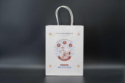 China OEM Kraft Paper Shopping Bags biodegradable Paper Kraft Bags With Handles for sale