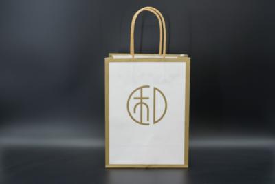 China ODM Recycled Paper Shopping Bags Personalized Bulk Kraft Bags With Handles for sale