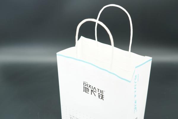 Quality Shopping Handle Paper Bags recycled White Paper Carrier Bags for sale