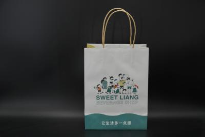 China Versatile Large Paper Gift Bags With Handles Yellow Twisted FSC for sale