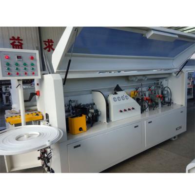 China Full automatic PVC edge banding machine KC307D with gluing end cutting rough  fine trimming scraping buffing functions for sale