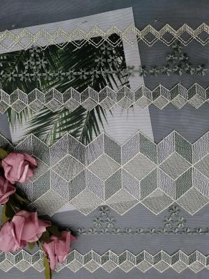China Geometric White Embroidered Tulle Fabric Luxury Bridal Lace Fabric for sale