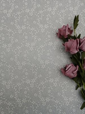 China Los pequeños licenciados florales de marfil 100% del poliéster de la tela del ajuste atan la tela en venta
