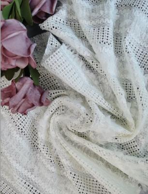 中国 白い刺繍されたレースの生地の花嫁のレースの生地の優雅な婚礼衣裳の服の生地 販売のため