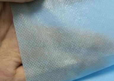 China PP+PE Laminated Nonwoven Fabric For Disposable Blue Isolation Gowns for sale