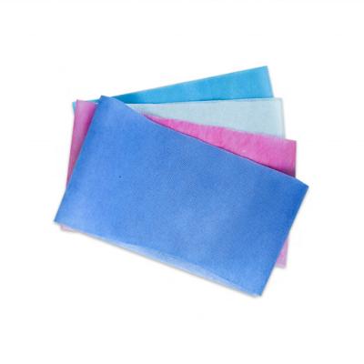 China 30gsm PP Non Woven Fabric Disposable Clothing Material With PE Film Laminate for sale